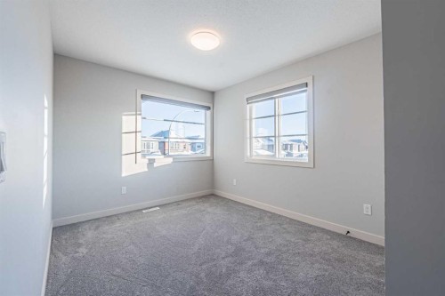 300 Savanna Way Ne, Calgary, AB - Indoor Photo Showing Other Room