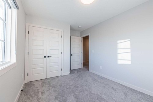 300 Savanna Way Ne, Calgary, AB - Indoor Photo Showing Other Room