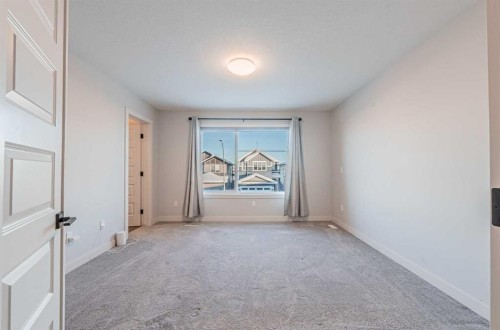 300 Savanna Way Ne, Calgary, AB - Indoor Photo Showing Other Room