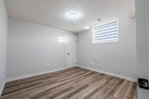 300 Savanna Way Ne, Calgary, AB - Indoor Photo Showing Other Room