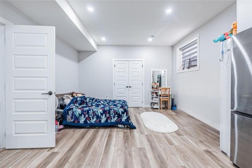 300 Savanna Way Ne, Calgary, AB - Indoor Photo Showing Bedroom