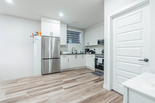 300 Savanna Way Ne, Calgary, AB - Indoor Photo Showing Kitchen
