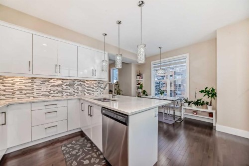 4 Quarry Lane Se, Calgary, AB - Indoor Photo Showing Kitchen With Double Sink With Upgraded Kitchen
