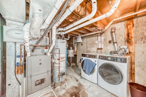 11 Falwood Place Ne, Calgary, AB - Indoor Photo Showing Laundry Room