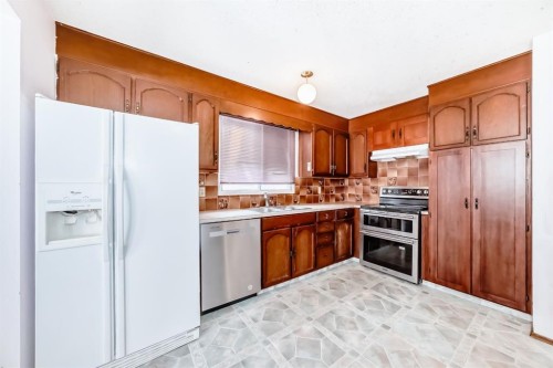 11 Falwood Place Ne, Calgary, AB - Indoor Photo Showing Kitchen