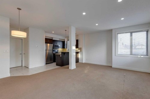 101-320 12 Avenue Ne, Calgary, AB - Indoor Photo Showing Kitchen