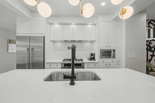 835 18 Avenue Nw, Calgary, AB - Indoor Photo Showing Kitchen With Stainless Steel Kitchen With Double Sink With Upgraded Kitchen