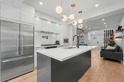 835 18 Avenue Nw, Calgary, AB - Indoor Photo Showing Kitchen With Stainless Steel Kitchen With Double Sink With Upgraded Kitchen