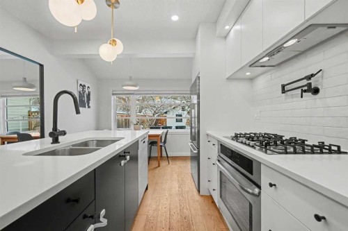 835 18 Avenue Nw, Calgary, AB - Indoor Photo Showing Kitchen With Double Sink With Upgraded Kitchen