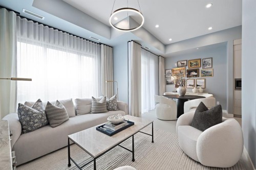 103-8375 Broadcast Avenue Sw, Calgary, AB - Indoor Photo Showing Living Room