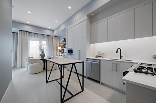 103-8375 Broadcast Avenue Sw, Calgary, AB - Indoor Photo Showing Kitchen