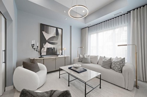 103-8375 Broadcast Avenue Sw, Calgary, AB - Indoor Photo Showing Living Room