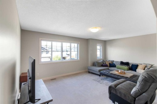 344 Windermere Drive, Chestermere, AB - Indoor Photo Showing Living Room
