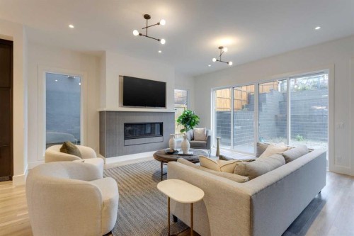 2036 30 Avenue Sw, Calgary, AB - Indoor Photo Showing Living Room With Fireplace