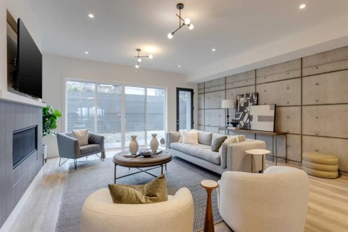 2036 30 Avenue Sw, Calgary, AB - Indoor Photo Showing Living Room With Fireplace