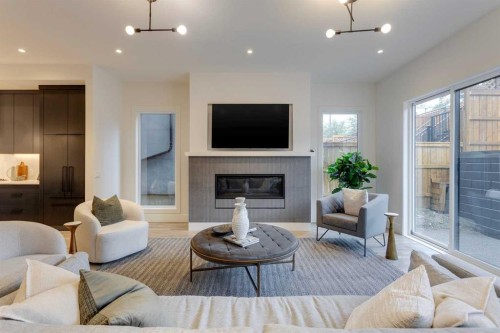 2036 30 Avenue Sw, Calgary, AB - Indoor Photo Showing Living Room With Fireplace