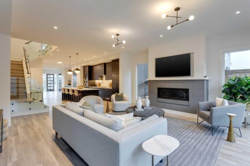 2036 30 Avenue Sw, Calgary, AB - Indoor Photo Showing Living Room With Fireplace
