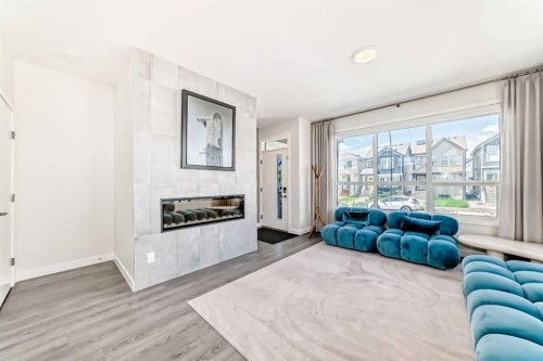 38 Lavender Road Se, Calgary, AB - Indoor Photo Showing Living Room With Fireplace