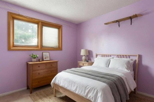 11 Ridgebrook Drive Sw, Airdrie, AB - Indoor Photo Showing Bedroom