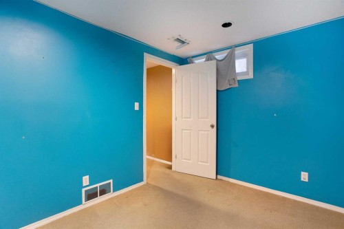 11 Ridgebrook Drive Sw, Airdrie, AB - Indoor Photo Showing Other Room