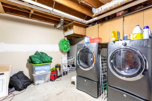 11 Ridgebrook Drive Sw, Airdrie, AB - Indoor Photo Showing Laundry Room