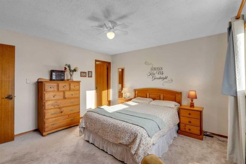 244 Ranchridge Court Nw, Calgary, AB - Indoor Photo Showing Bedroom