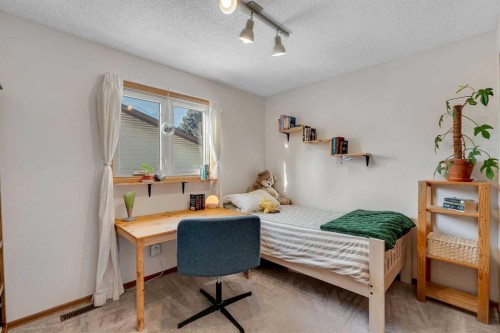 244 Ranchridge Court Nw, Calgary, AB - Indoor Photo Showing Bedroom
