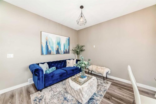536 Redstone View Ne, Calgary, AB - Indoor Photo Showing Living Room