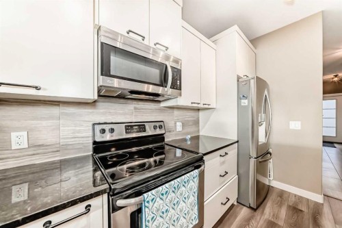 536 Redstone View Ne, Calgary, AB - Indoor Photo Showing Kitchen With Upgraded Kitchen