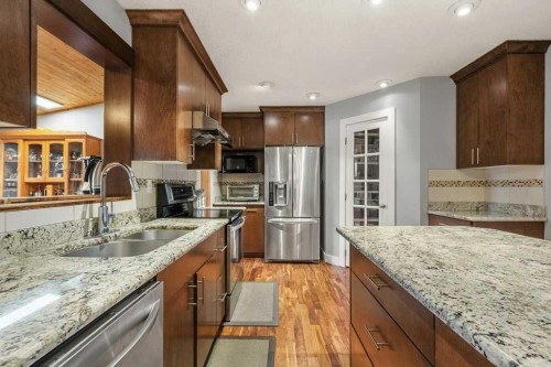 4704 Marbury Place Ne, Calgary, AB - Indoor Photo Showing Kitchen With Stainless Steel Kitchen With Double Sink With Upgraded Kitchen