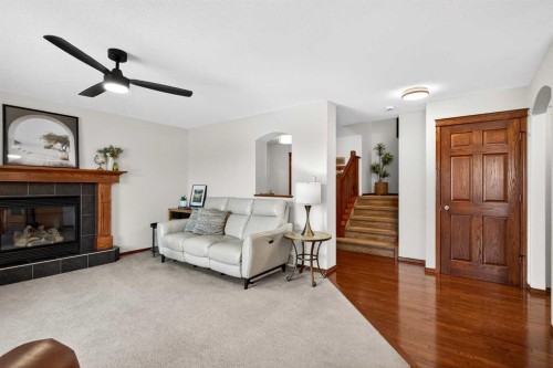 228 Sagewood Landing Sw, Airdrie, AB - Indoor Photo Showing Living Room With Fireplace