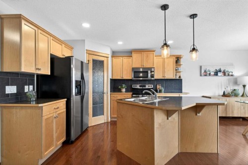 228 Sagewood Landing Sw, Airdrie, AB - Indoor Photo Showing Kitchen With Double Sink