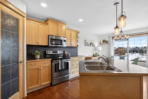 228 Sagewood Landing Sw, Airdrie, AB - Indoor Photo Showing Kitchen With Double Sink