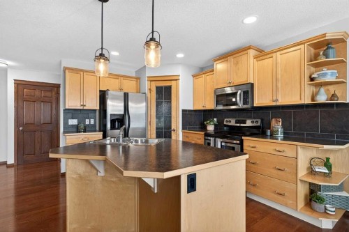 228 Sagewood Landing Sw, Airdrie, AB - Indoor Photo Showing Kitchen With Double Sink