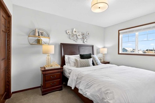 228 Sagewood Landing Sw, Airdrie, AB - Indoor Photo Showing Bedroom
