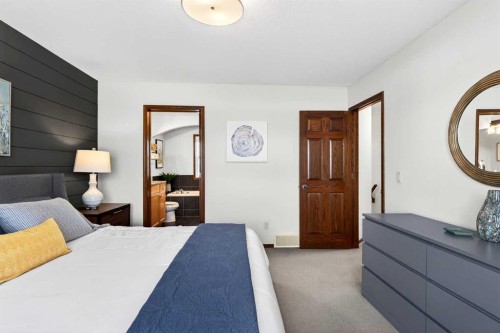 228 Sagewood Landing Sw, Airdrie, AB - Indoor Photo Showing Bedroom
