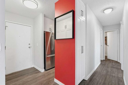 707-4944 Dalton Drive Nw, Calgary, AB - Indoor Photo Showing Other Room