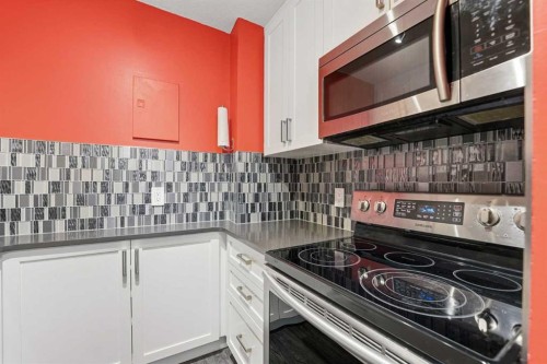 707-4944 Dalton Drive Nw, Calgary, AB - Indoor Photo Showing Kitchen