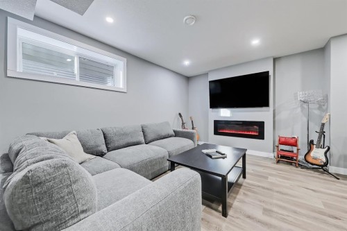 300 Marquis Heights Se, Calgary, AB - Indoor With Fireplace
