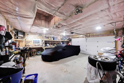 300 Marquis Heights Se, Calgary, AB - Indoor Photo Showing Garage