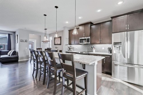 300 Marquis Heights Se, Calgary, AB - Indoor Photo Showing Kitchen With Stainless Steel Kitchen With Upgraded Kitchen