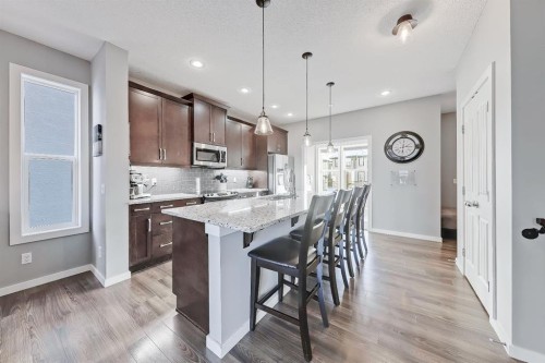 300 Marquis Heights Se, Calgary, AB - Indoor Photo Showing Kitchen With Upgraded Kitchen