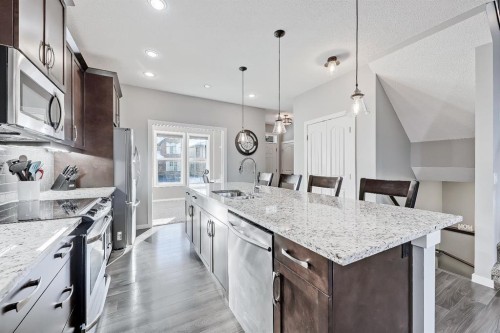 300 Marquis Heights Se, Calgary, AB - Indoor Photo Showing Kitchen With Upgraded Kitchen