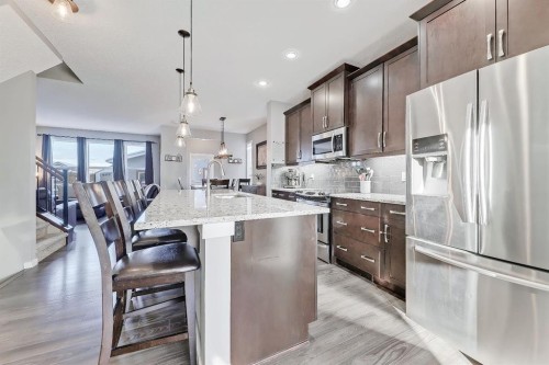 300 Marquis Heights Se, Calgary, AB - Indoor Photo Showing Kitchen With Stainless Steel Kitchen With Upgraded Kitchen
