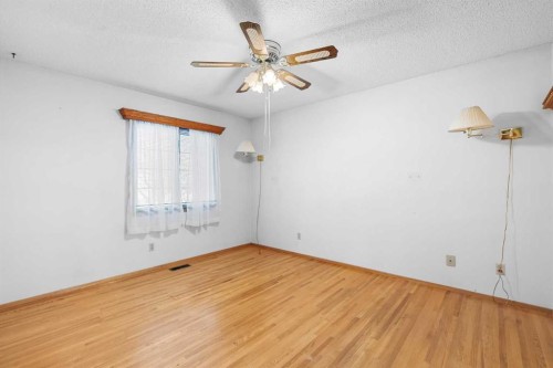 10727 Mapleglen Crescent Se, Calgary, AB - Indoor Photo Showing Other Room