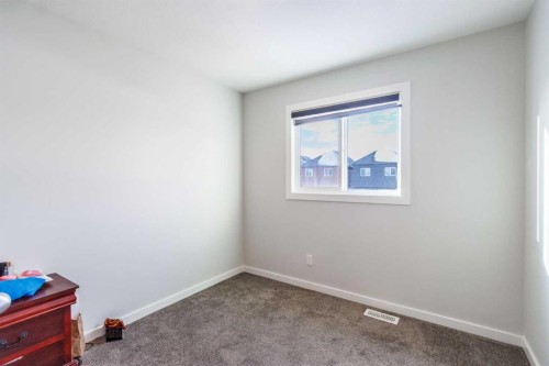 61 Savanna Link Ne, Calgary, AB - Indoor Photo Showing Other Room
