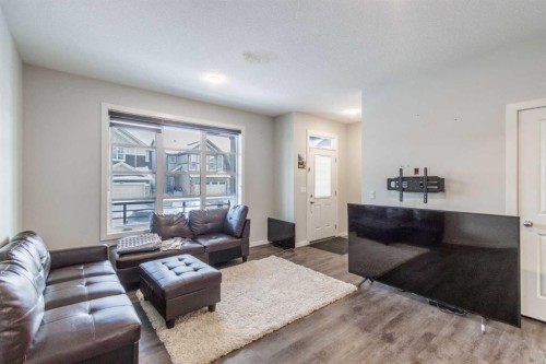61 Savanna Link Ne, Calgary, AB - Indoor Photo Showing Living Room