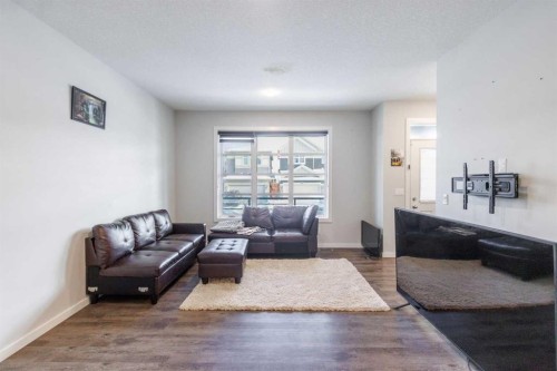 61 Savanna Link Ne, Calgary, AB - Indoor Photo Showing Living Room