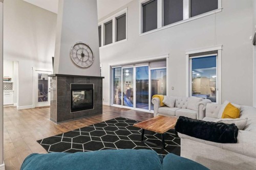 163 Masters Cove Se, Calgary, AB - Indoor Photo Showing Living Room With Fireplace