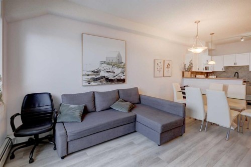 402-120 Country Village Circle Ne, Calgary, AB - Indoor Photo Showing Living Room
